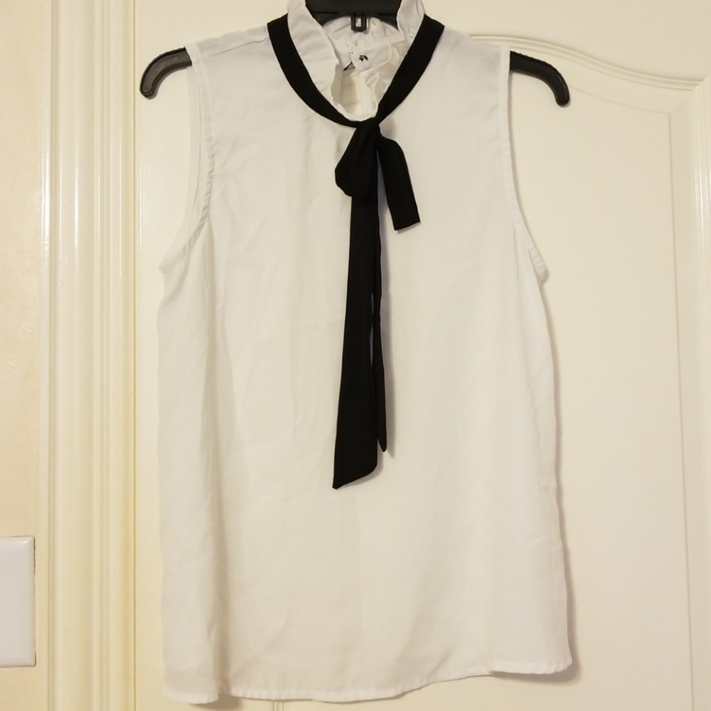 White blouse with black tie